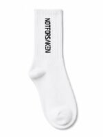 White sock with bold black vertical lettering along the leg that reads 'NOT FOR SALE' (or 'NOT FOR...' depending on wording).